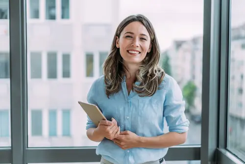 Confident businesswoman in modern office.